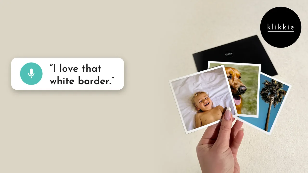 Retro photo prints with a white border held in one hand above a black klikkie envelope