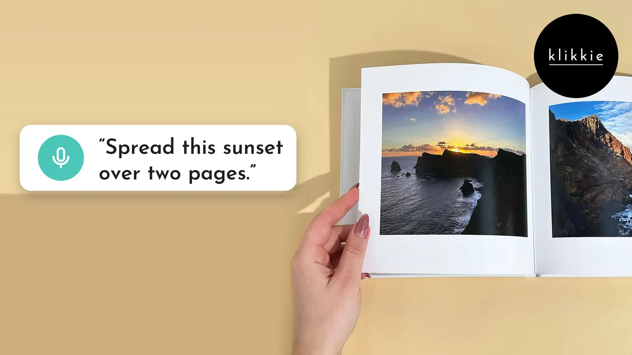 A hand holding an open klikkie photo book with a sunset over the sea, with the words “Spread this sunset over two pages.”